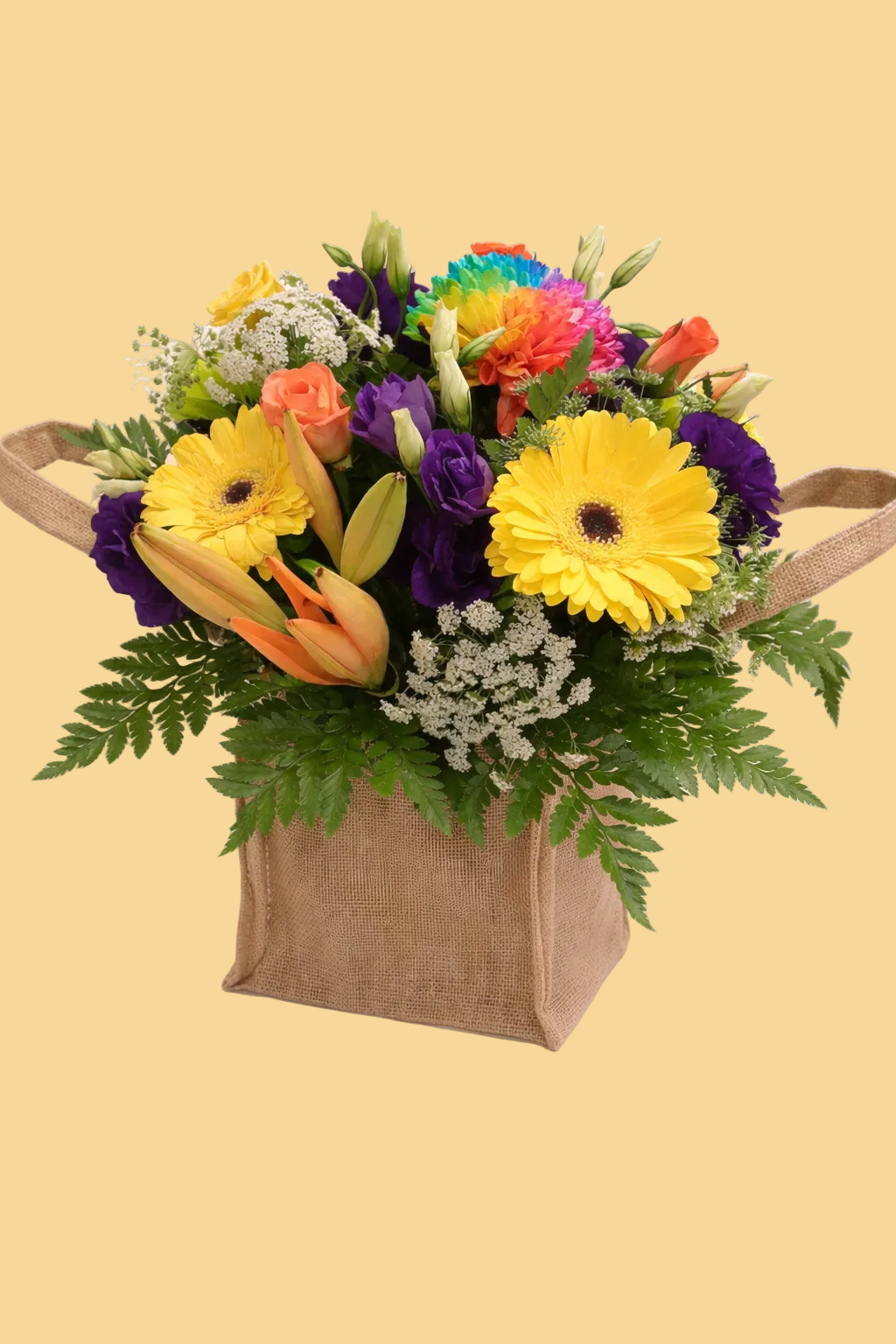 Colorful flower arrangement in a brown paper bag on a beige background