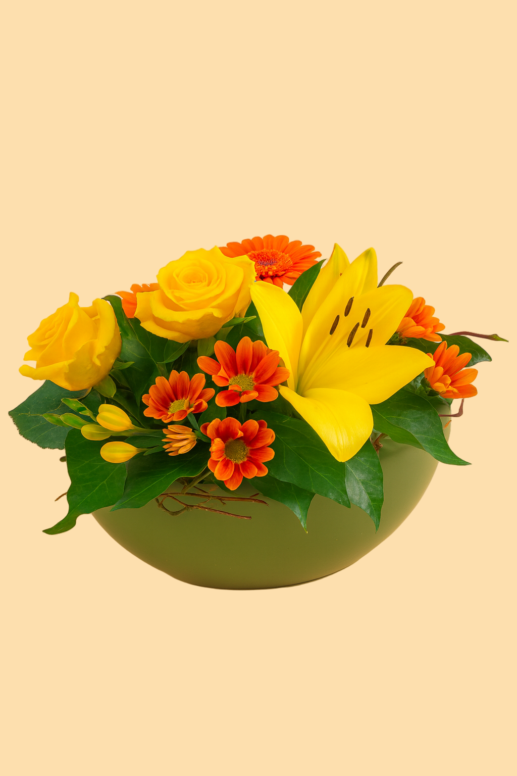 Bouquet of yellow and orange flowers in a green vase on a beige background